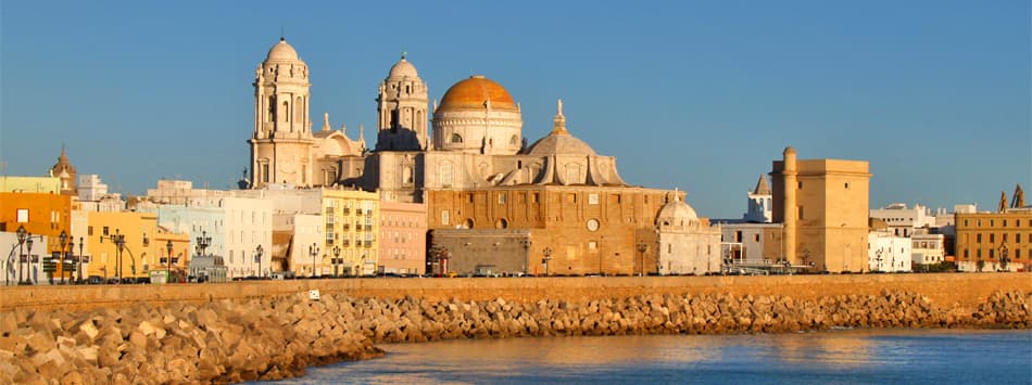 Cadiz cathedral over the Atlantic Ocean. Day trip to Cadiz and Jerez