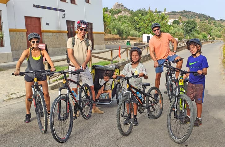 A family touring with their guide in Spain