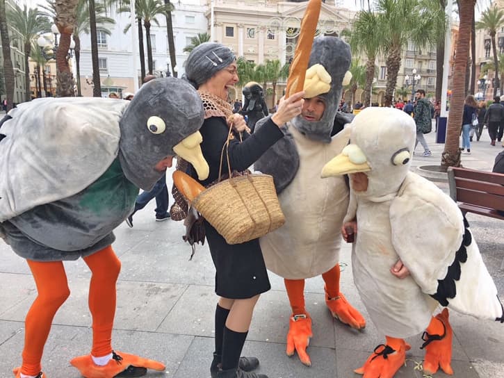 Locals in costumes at the Carnival of Cadiz