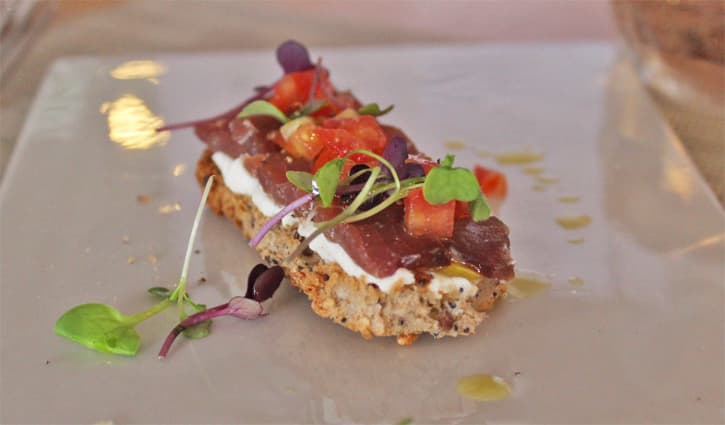 a plate with a toast of half cured on top