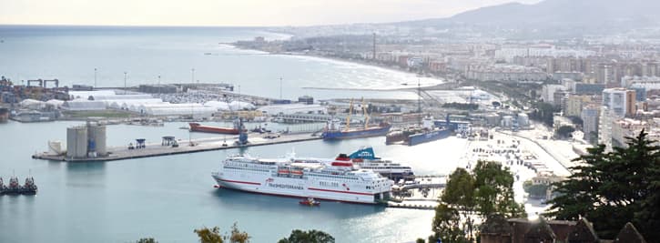 A cruise ship docking in a Southern Spanish port
