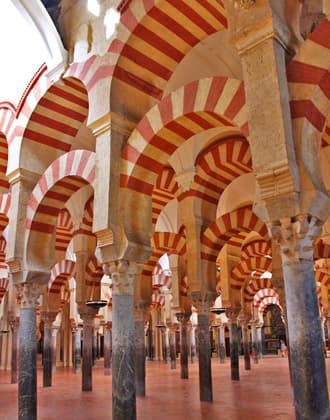 Moorish arches in the Great Mosque of Cordoba Spain
