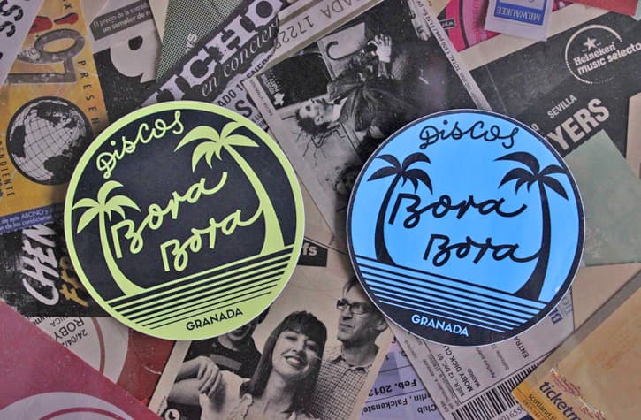 Two stickers from Granada record shop Discos Bora Bora